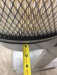 Using a tape measure to center the filter.